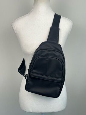 Gogo black nylon convertible strap mini crossbody sling bag.
